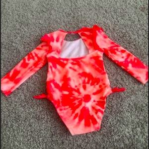 18 month baby girl swim suit never worn.